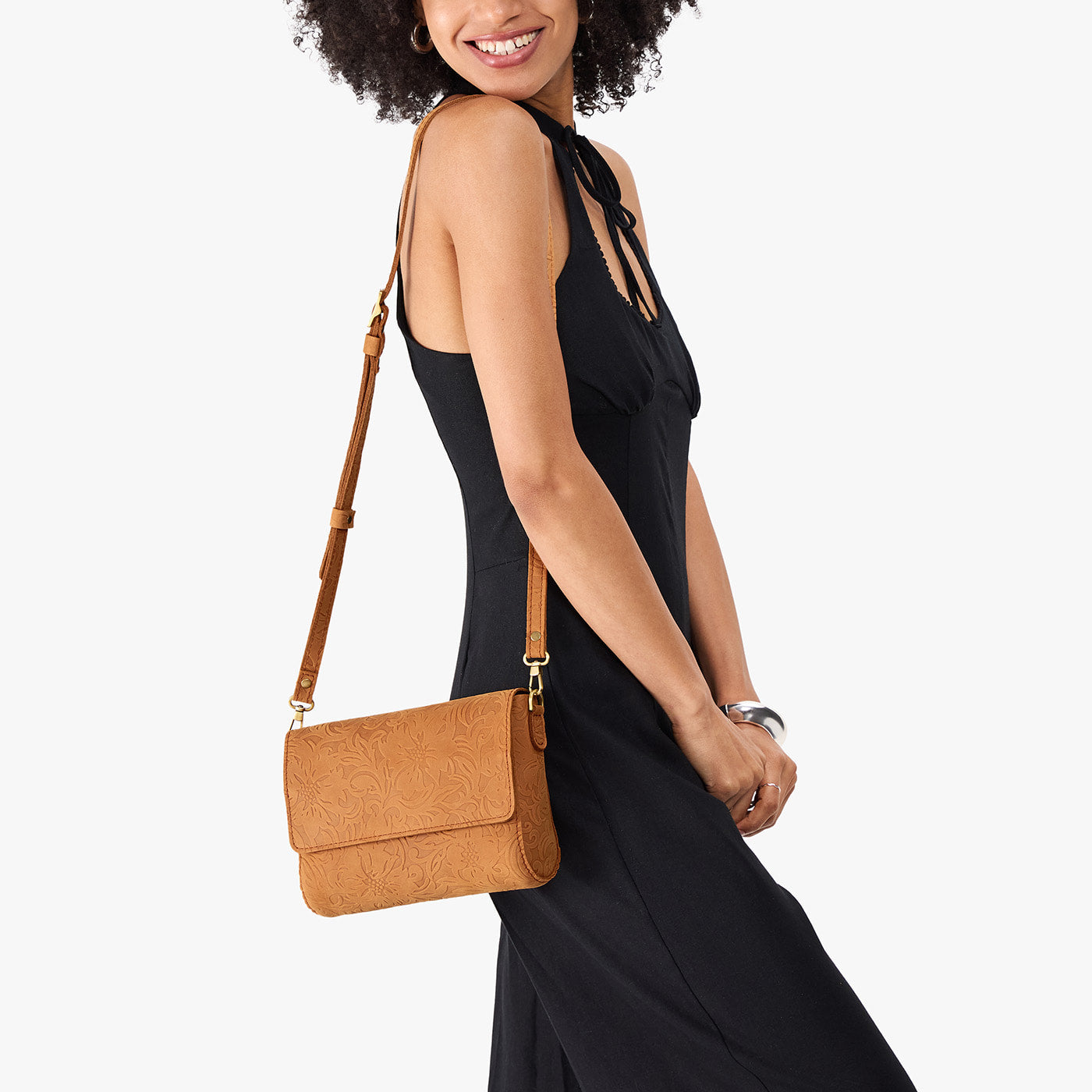 Desert Flower | Model wearing leather Crossbody Bag with Magnetic Messenger Bag Closure