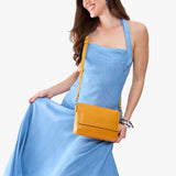 Sunshine Medium | Model Wearing Small Leather Crossbody Bag with Magnetic Messenger Bag Closure