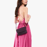 Larkspur Mini | Model wearing leather Crossbody Bag with Magnetic Messenger Bag 