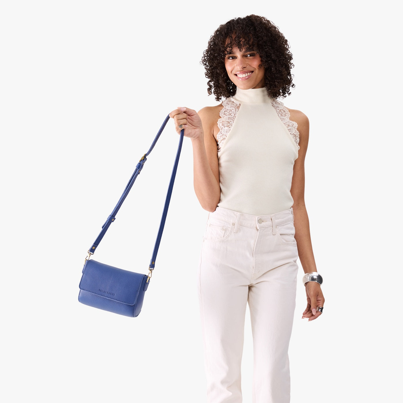 Molino Blue*Mini | Model Holding Small Leather Crossbody Bag with Magnetic Messenger Bag Closure