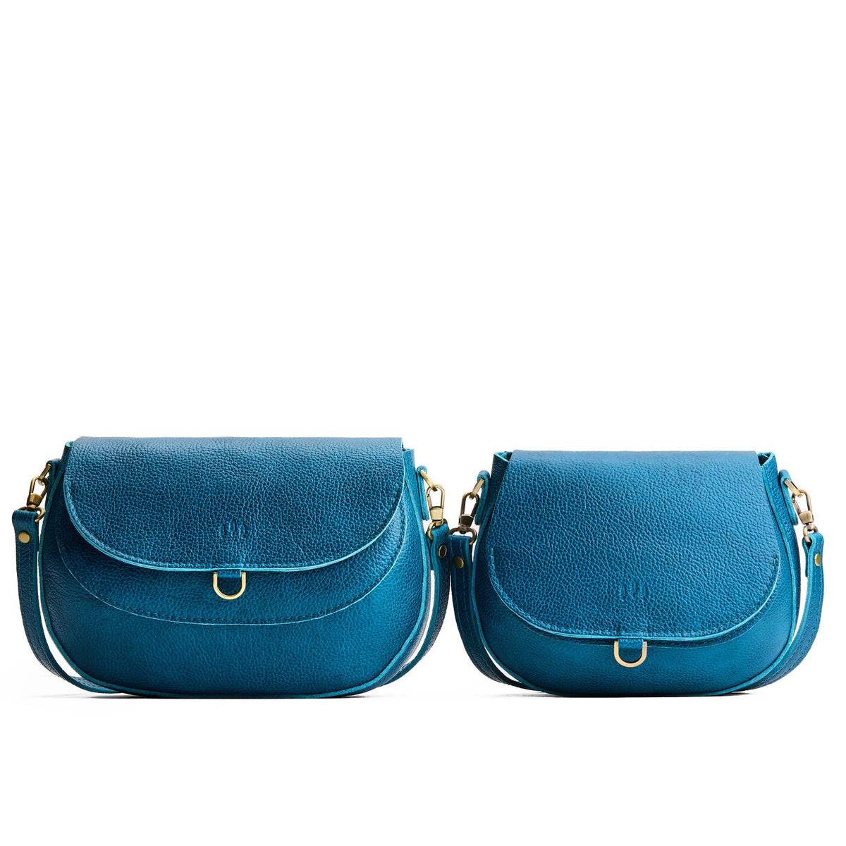 Planetary | Size comparison of two leather Crossbodies with a flaps and magnetic closures