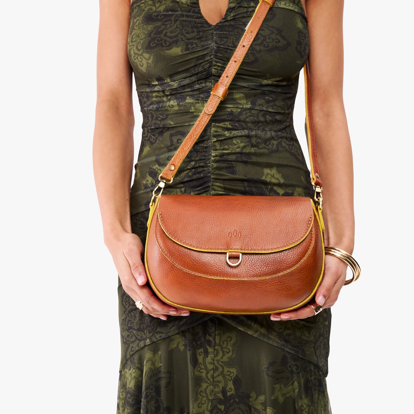 Sienna*Large | Model wearing a leather Crossbody with a flap and magnetic closure