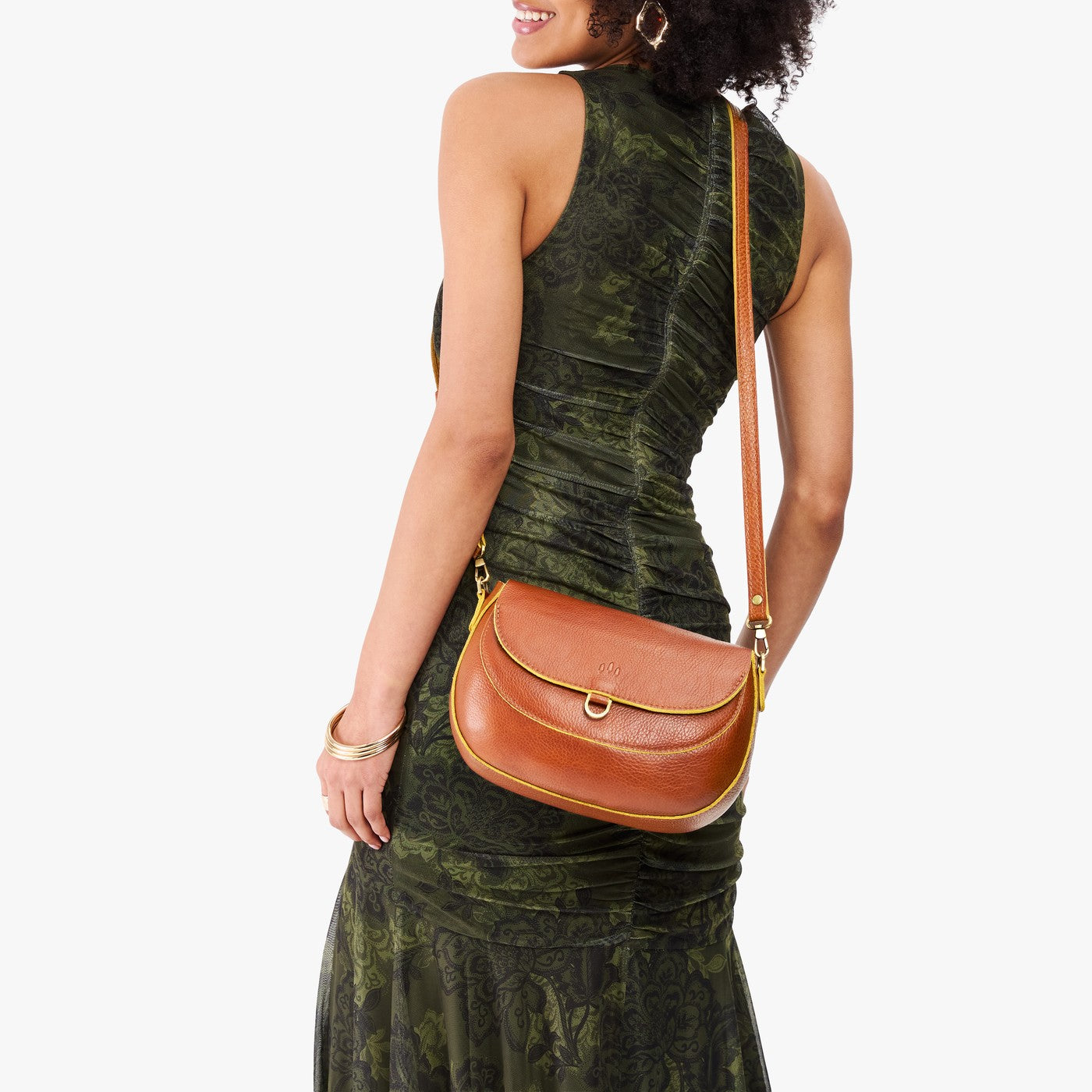 Sienna*Large | Model wearing a leather Crossbody with a flap and magnetic closure