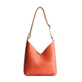 Koi Small | Petite shoulder bag with adjustable strap and magnetic snap closure