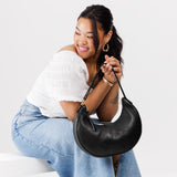 Pebbled--black Classic | Crescent shaped shoulder bag with zipper closure and adjustable strap