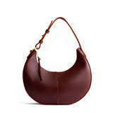 Cognac Classic | Crescent shaped shoulder bag with zipper closure and adjustable strap