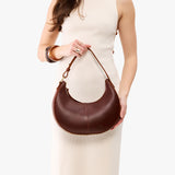 Cognac Classic | Crescent shaped shoulder bag with zipper closure and adjustable strap
