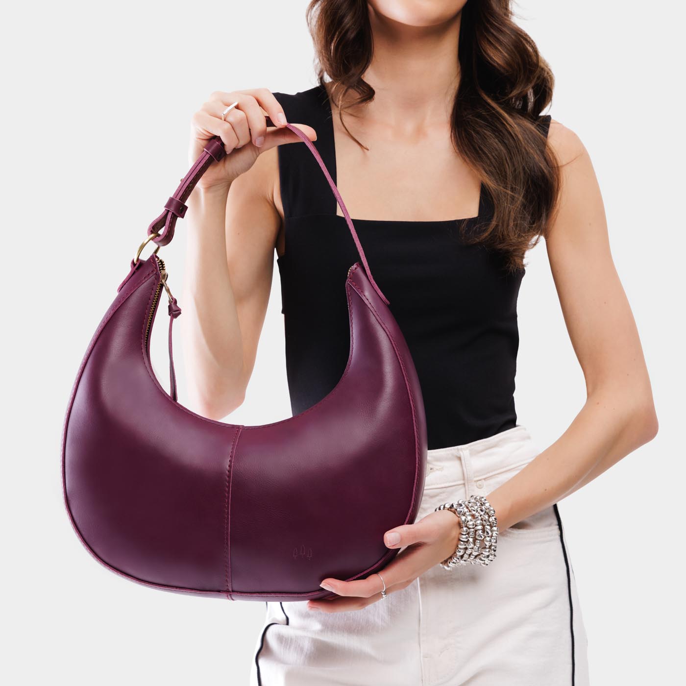Lollipop*Large | Crescent shaped shoulder bag with zipper closure and adjustable strap