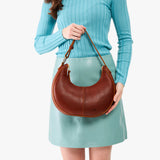 Nutmeg Classic | Crescent shaped shoulder bag with zipper closure and adjustable strap