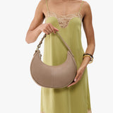 Stone Classic | Crescent shaped shoulder bag with zipper closure and adjustable strap