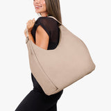 Taupe Oversized | Model holding large shoulder bag