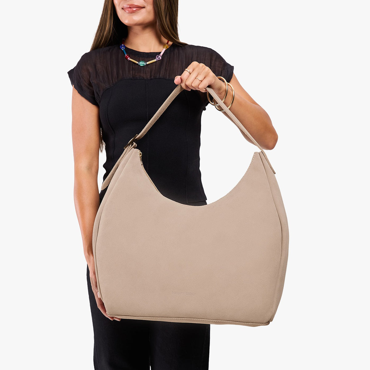 Taupe*Oversized | Model holding large shoulder bag