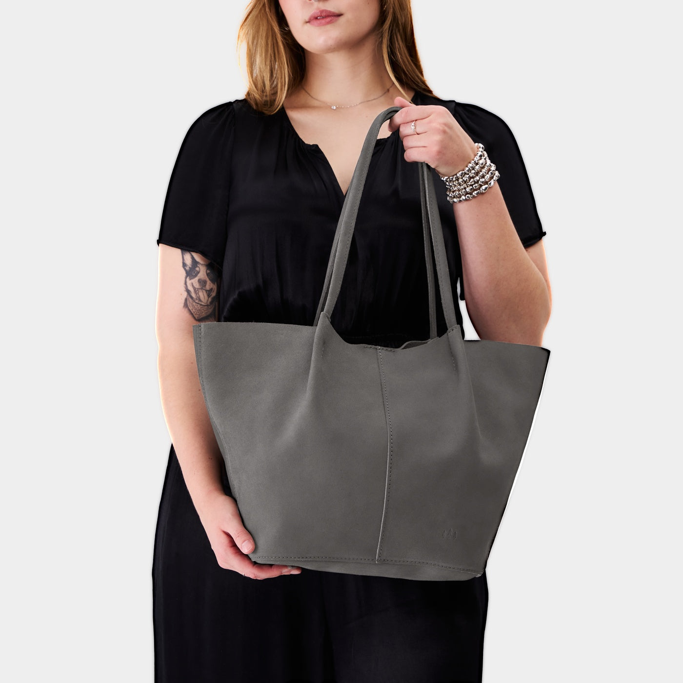 Smoke Grey*Oversized | Model holding a  leather tote bag 