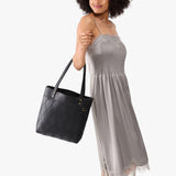 Graphite Medium Classic | Leather tote bag with riveted straps and exterior key loop