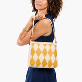 Sun Glaze Small | Triangular shoulder bag with antiqued brass finished hardware