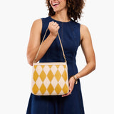 Sun Glaze Small | Triangular shoulder bag with antiqued brass finished hardware