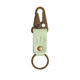 Pistachio Short | leather logo branded keychain 