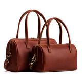 Chestnut Small | Two sizes of mini duffle shaped handbag with crossbody strap