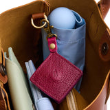 Orchid | Diamond shaped leather AirTag holder on a lobster clasp keychain