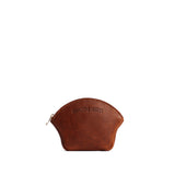 Nutmeg Small | Seashell shaped leather makeup bag with curved top zipper and flat bottom