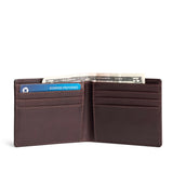 Trailstone Deluxe | Bifold leather wallet with visible stitching on a white background