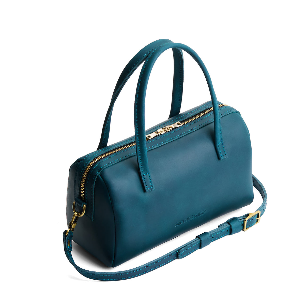 Westward Blue*Large | Mini duffle shaped handbag with crossbody strap