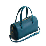 Westward Blue Large | Mini duffle shaped handbag with crossbody strap