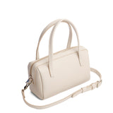 Pebbled Bone Small | Mini duffle shaped handbag with crossbody strap