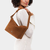 Jackson Small | Petite slouchy leather shoulder bag with zipper opening and three metal tree emblems