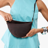Moose Small | Model wearing petite half circle shaped sling bag