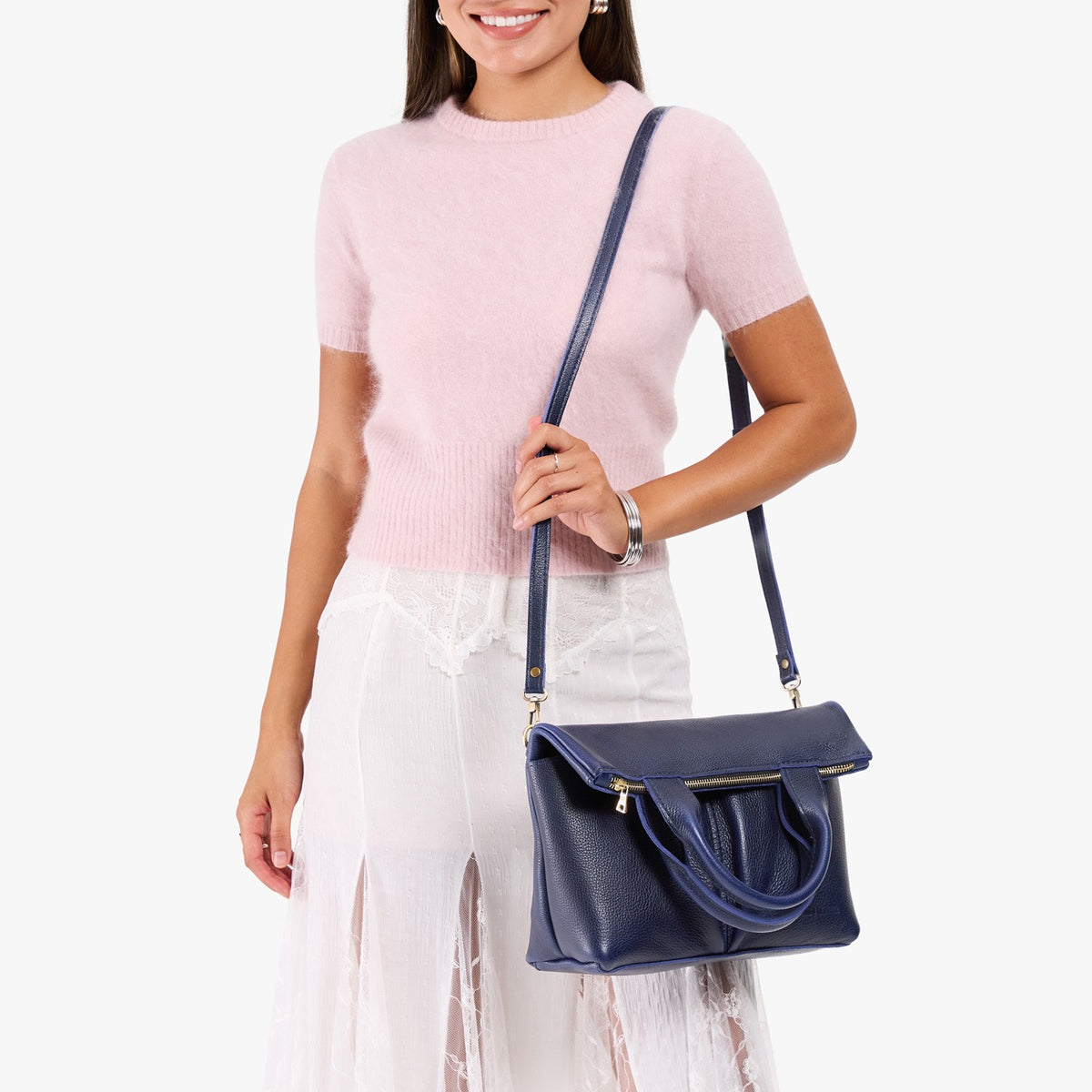 Cobalt*Small | Model wearing a convertible tote clutch crossbody