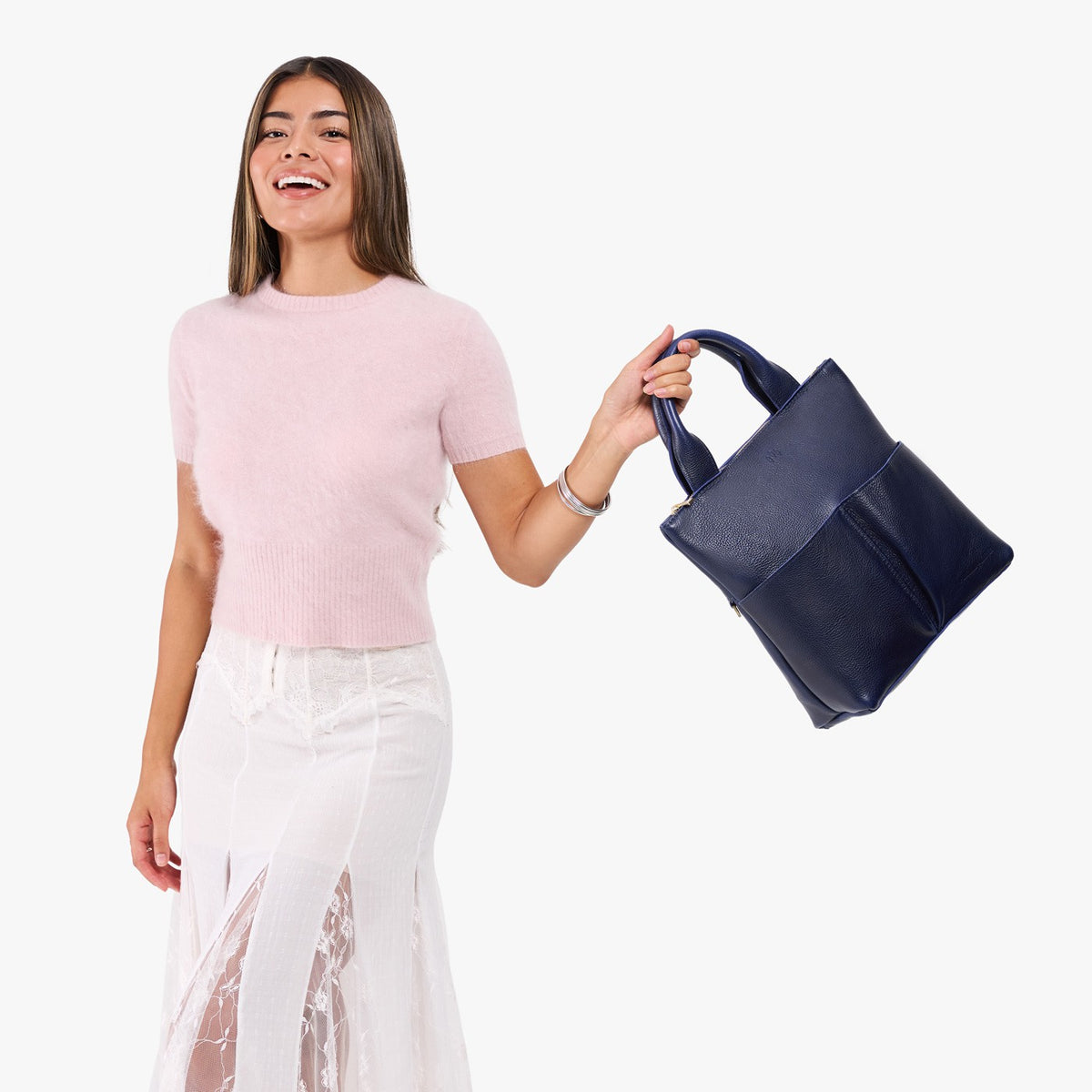 Cobalt*Small | Model wearing a convertible tote clutch crossbody