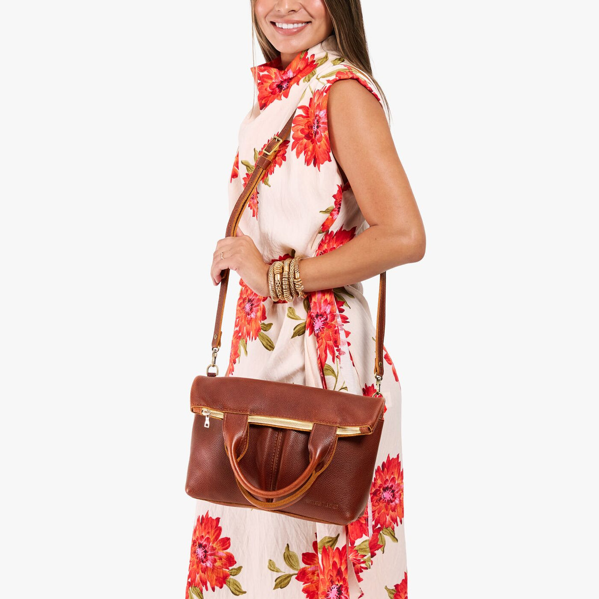 Nutmeg*Small | Model wearing a convertible tote clutch crossbody