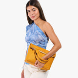 Sunshine Small | Model wearing a convertible tote clutch crossbody