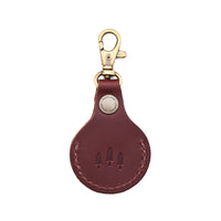 Cognac | Round leather AirTag holder with snap closure and swivel lobster claw clasp
