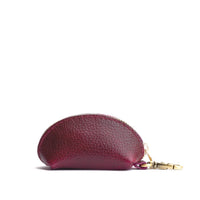 Orchid | Taco shaped leather pouch with zipper and swivel lobster clasp on white background