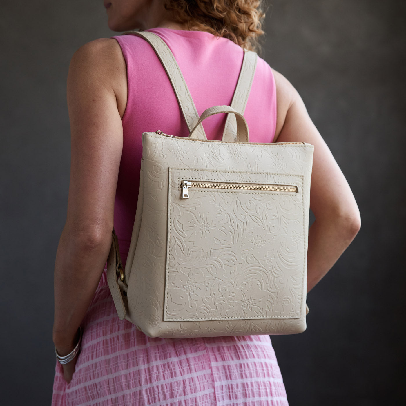 Jasmine | Model wearing square slim leather tote backpack