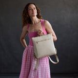 Jasmine | Model wearing square slim leather tote backpack