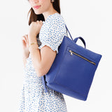 Molino Blue Classic | Model wearing square slim leather tote backpack