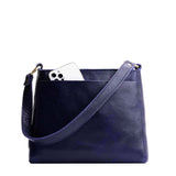Cobalt Classic | Triangular shoulder bag with antiqued brass finished hardware