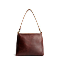 Cognac*Small | Triangular shoulder bag with antiqued brass finished hardware