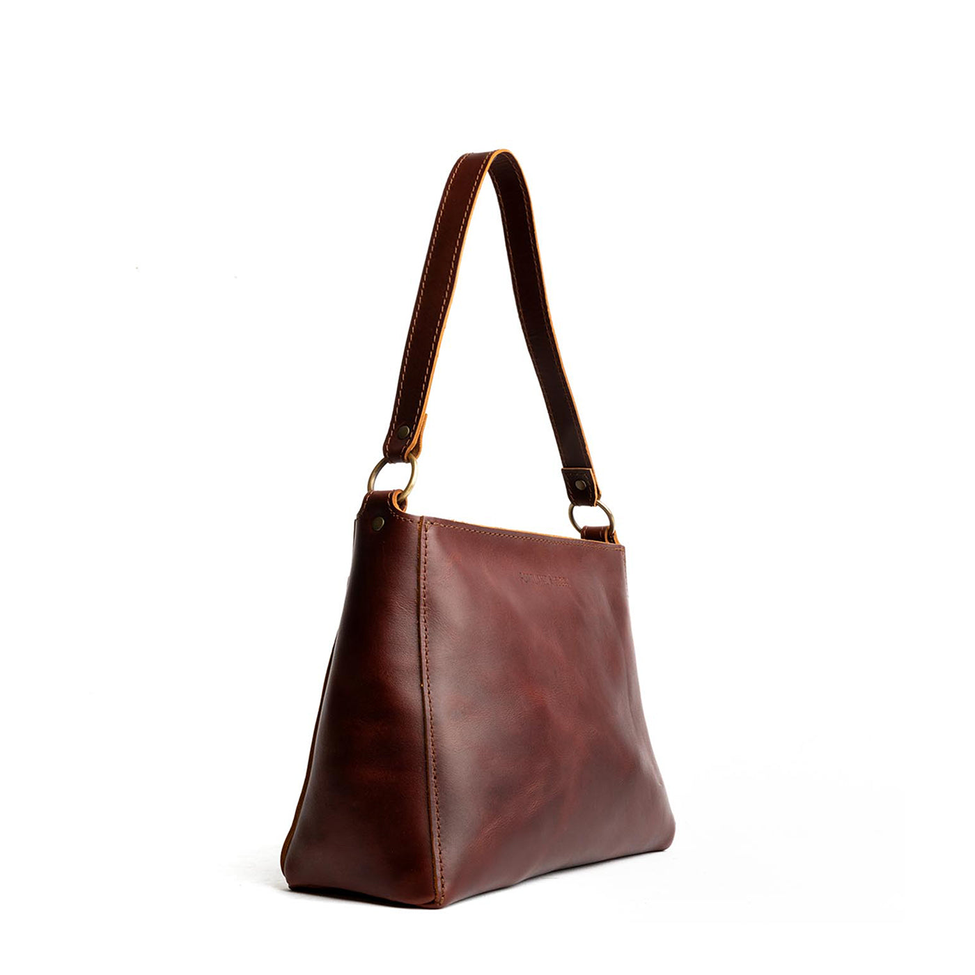 Cognac*Small | Triangular shoulder bag with antiqued brass finished hardware