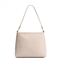 Jasmine | Triangular shoulder bag with antiqued brass finished 