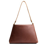 Asheville Large | Large triangular shoulder bag with antiqued brass finished hardware