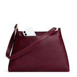 Cabernet Large | Large triangular shoulder bag with antiqued brass finished hardware