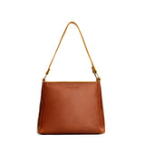 Sienna Small | Triangular shoulder bag with antiqued brass finished hardware
