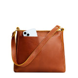 Sienna Small | Triangular shoulder bag with antiqued brass finished hardware
