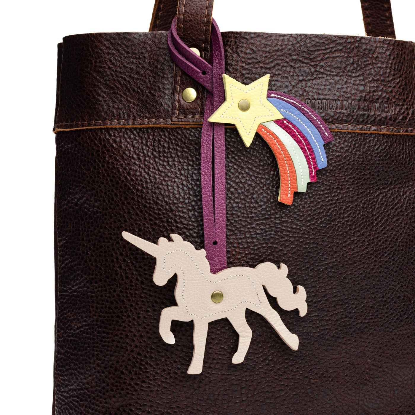Pebbled Bone | Unicorn and Shooting star duel ended tassel 