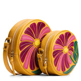 Wildflower Sunshine | Large and small circle shaped crossbody bags with large flower embroidered design