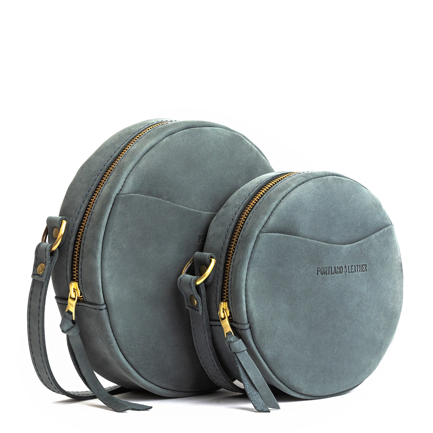 Storm | Circle shaped crossbody bag with top zipper